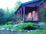 Log Home Porch at cozy romantic getaway mountain retreat in NY's Adirondack State Park NY Cabin Rental fully equiped